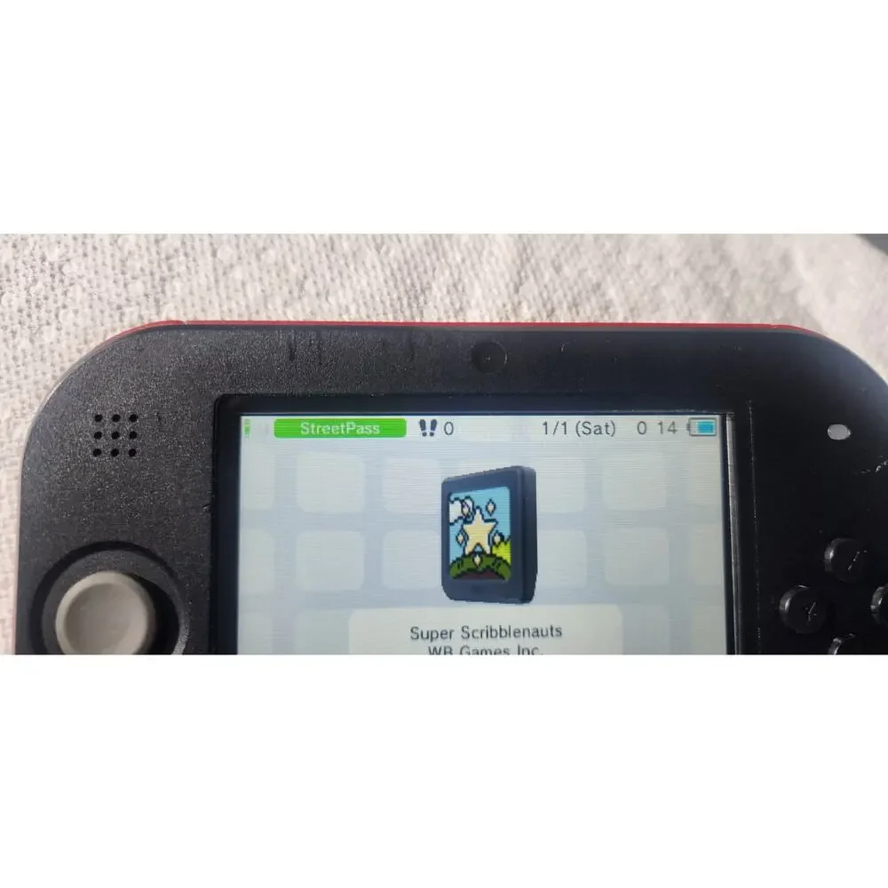 2DS Console with [8] 2DS games, Box, and Plastic Case, Everything Works